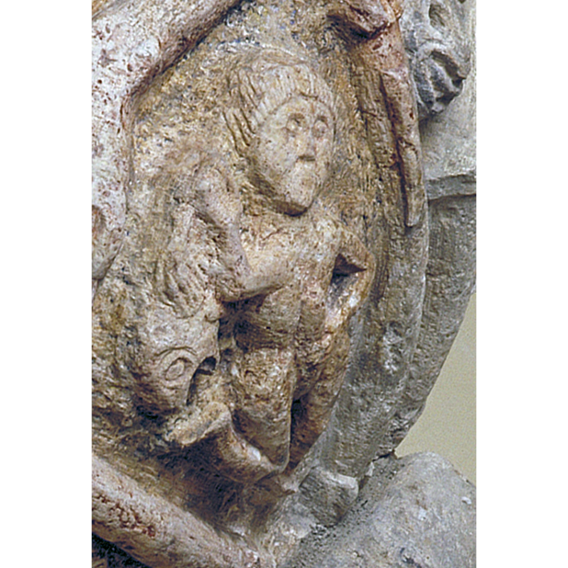 Probably a monk, to judge by the tonsure