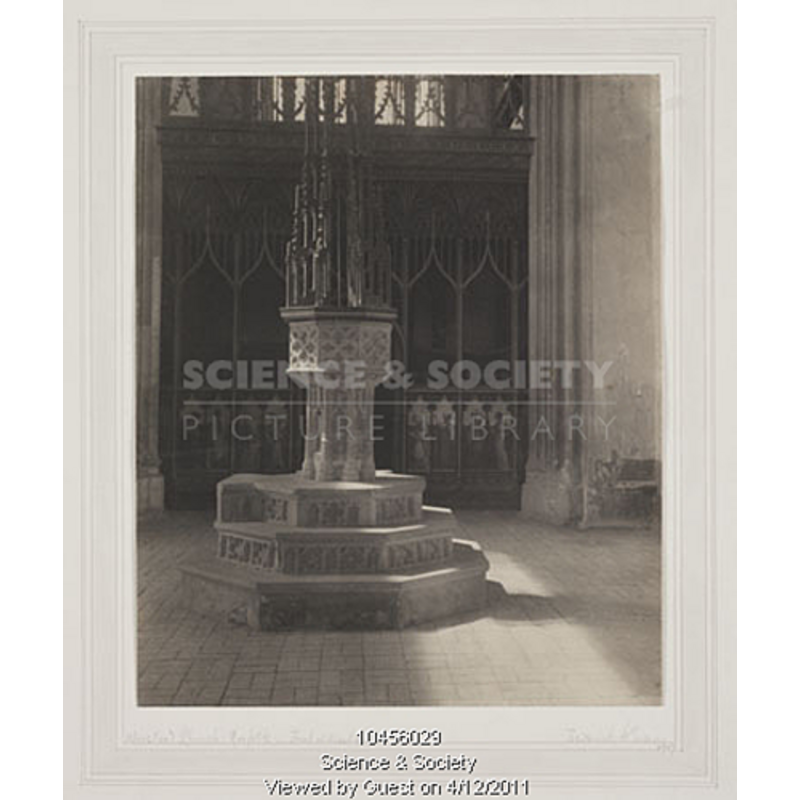the font and cover at the west end of the nave, in 1907