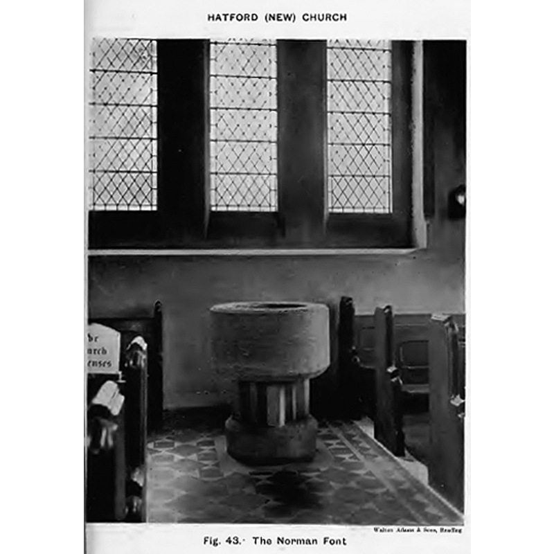 the old font shown in the interior of the Holy Trinity Church at the time [ca, 1914]; when this new church was deconsecrated the font was moved back to St. George's, the original Norman church