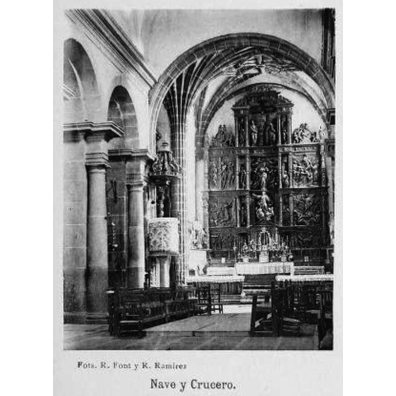 the main altar and retable visible at the back