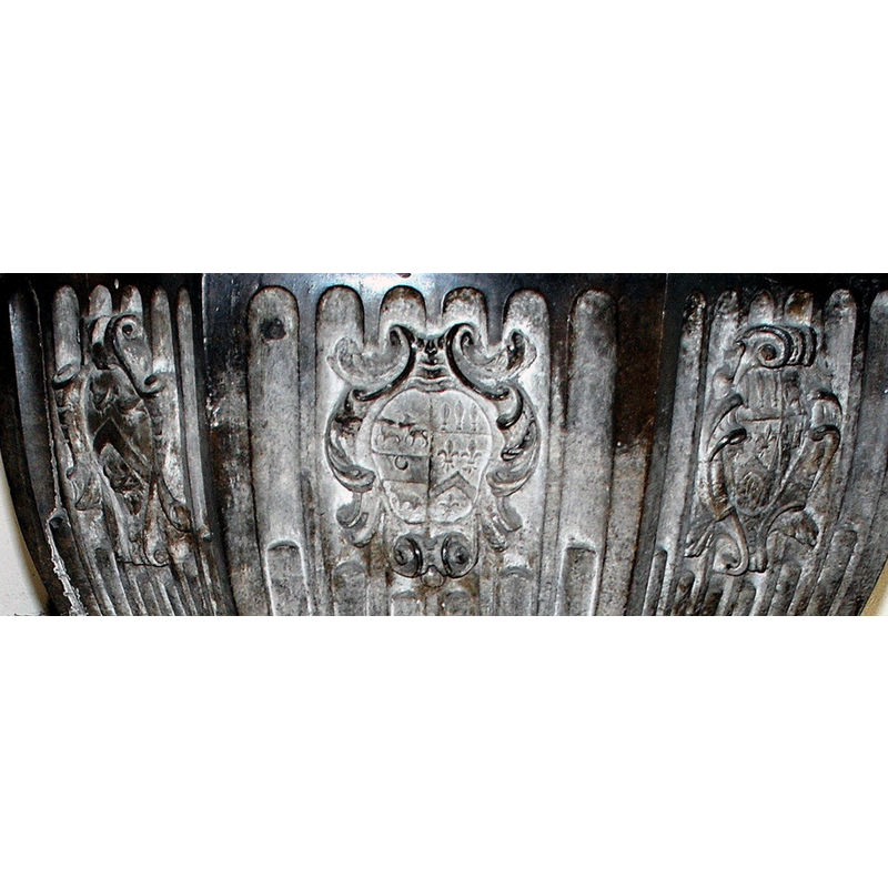 three of the re-carved shields on the northeast side of the basin