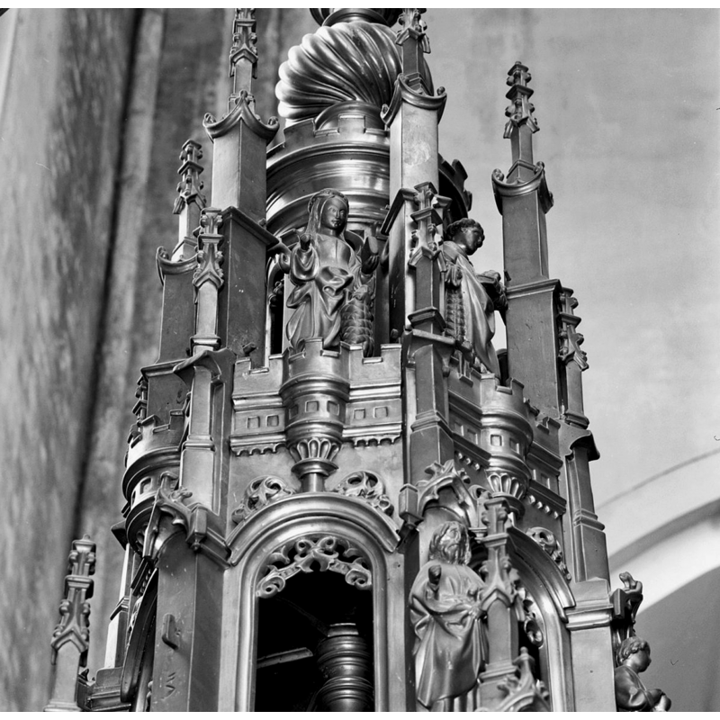 upper level below the finial