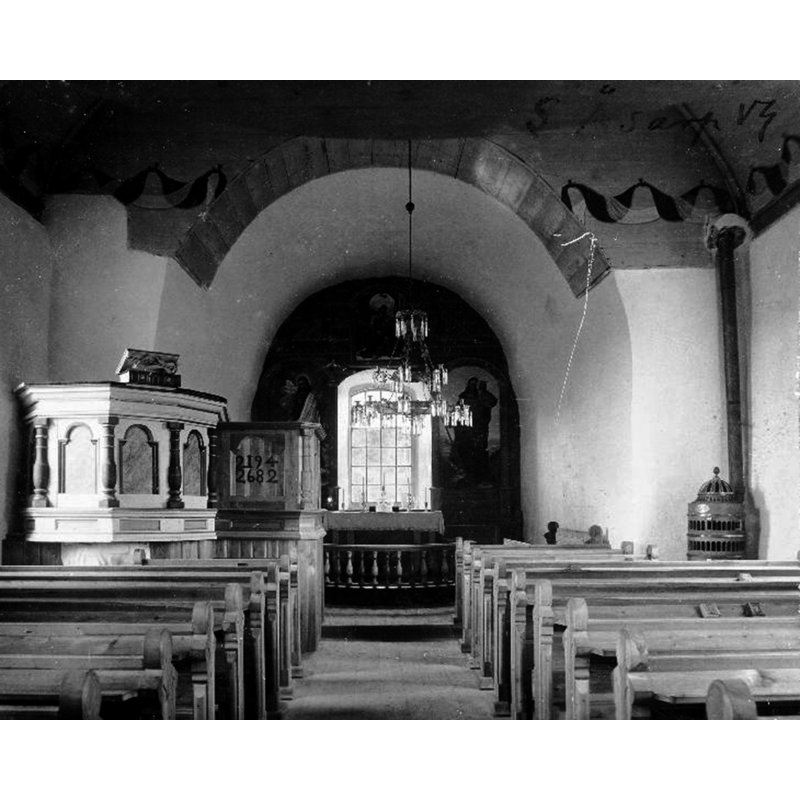 though almost invisible in this photograph, the font was at the time being used as the base for the pulpit