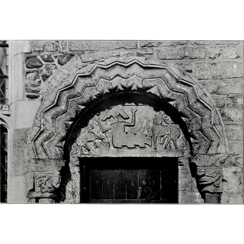 As the CRSBI suggests, although it is now the priest's doorway, it must have been originally the main portal