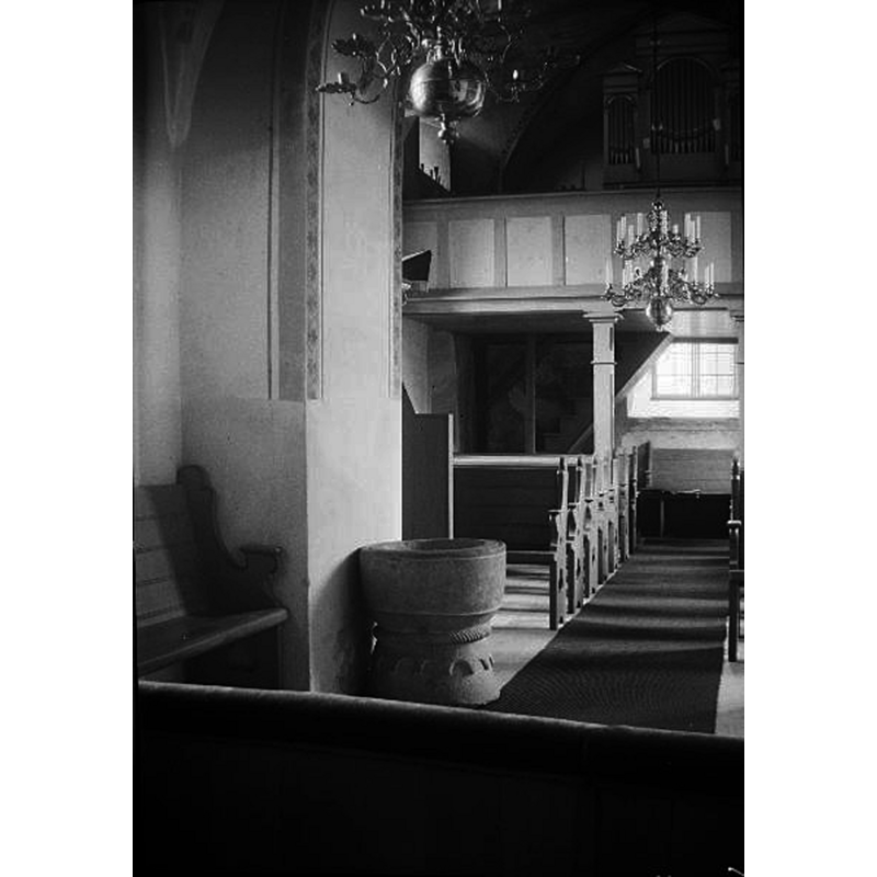 in the nave, by the south pillar of the chancel arch