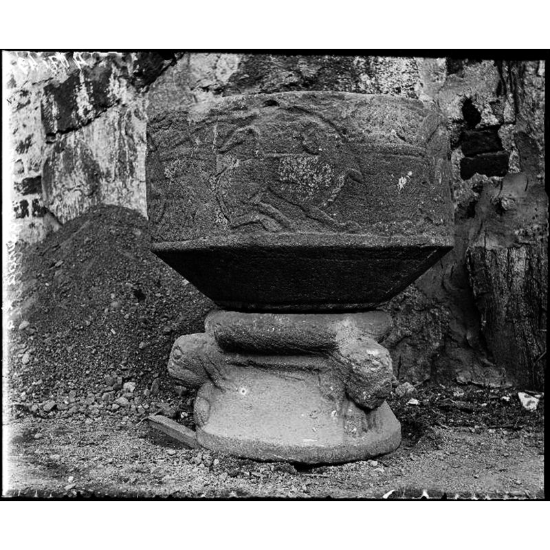 probably animal; pair of paws or hands below