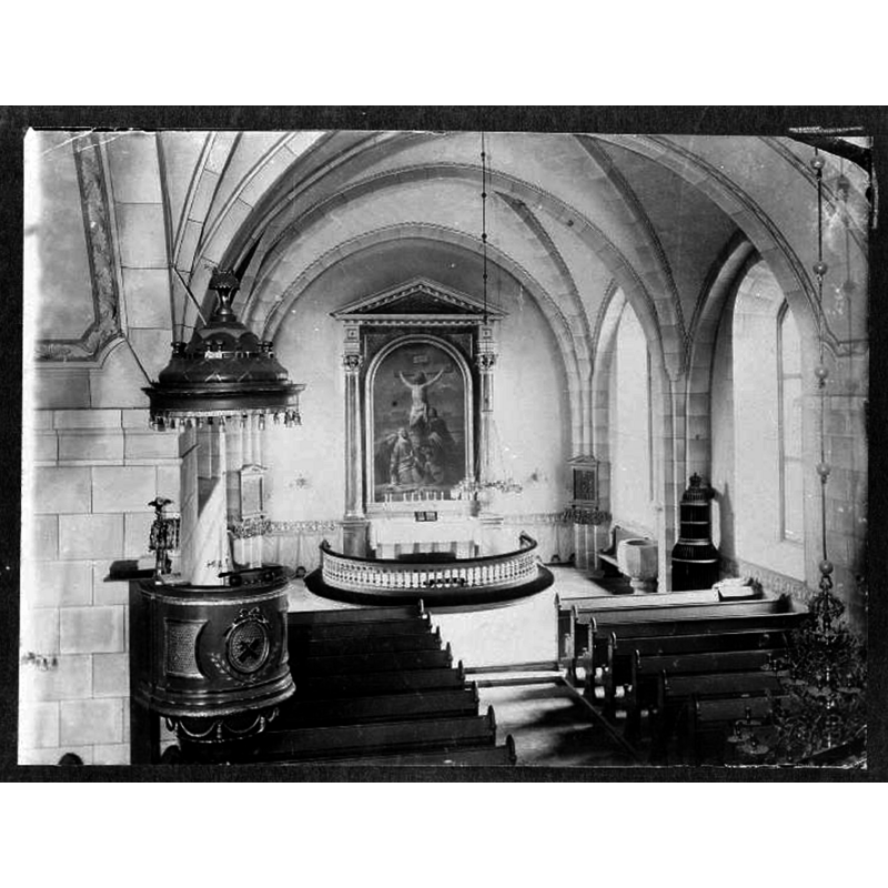 the font is partially visible to the right of the altar
