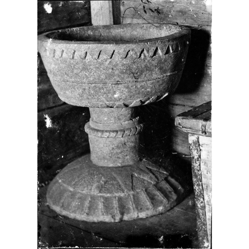 the medieval font photographed still in the old church? the old church was demolished in 1895 and the font was moved to the new church, therefore the photograph must be dated before 1895