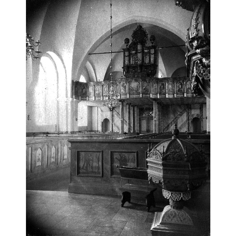 the late-17thC font and cover partially visible in the bottom-left corner