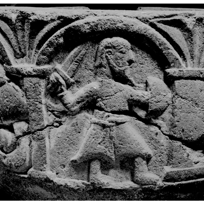 the posiion of the shoulders suggests the sword is in the left hand but the detail of the fingers of the hand holding the weapon is anatomically impossible regardless of the hand involved
