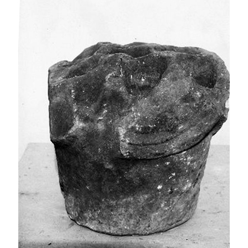 a fragment of a holy-water stoup from the old church