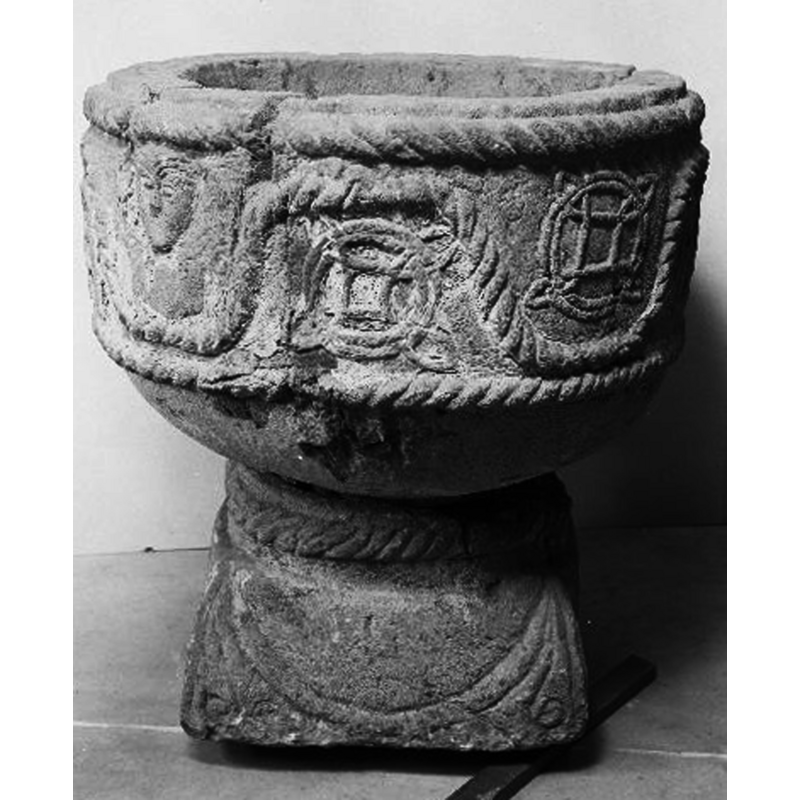 two of the them seen here to the right of the human bust -- sometimes called a Viking knot but often found on Anglo-Saxon as well as Scandinavian art