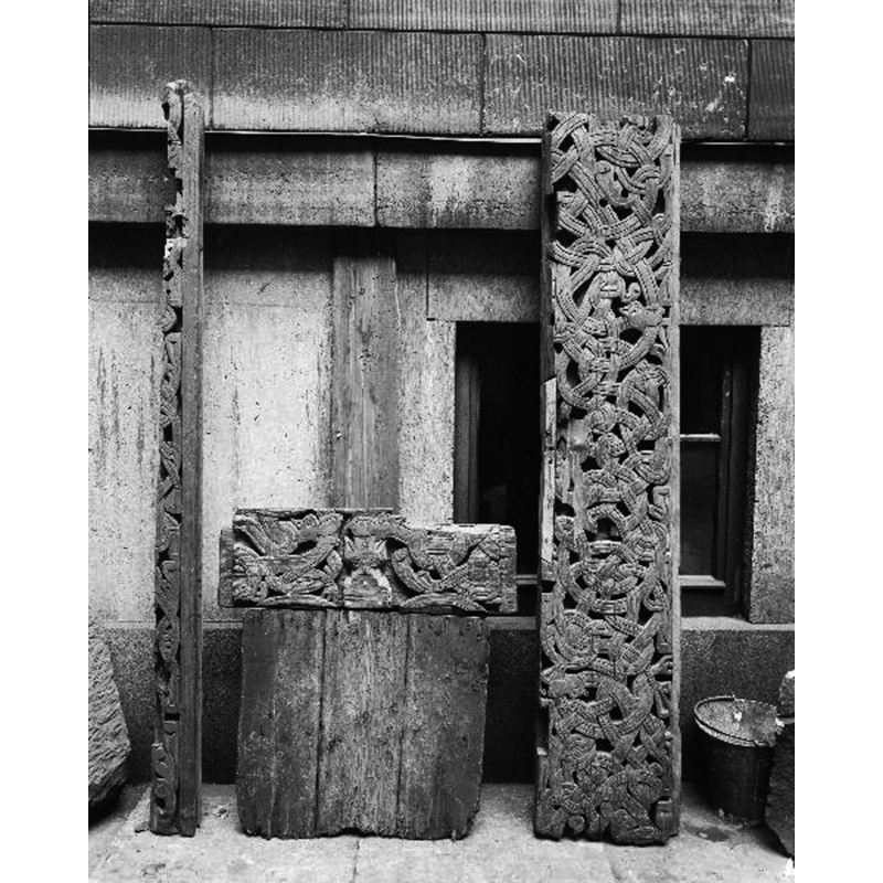 fragments of a door and doorway of the medieval wooden church