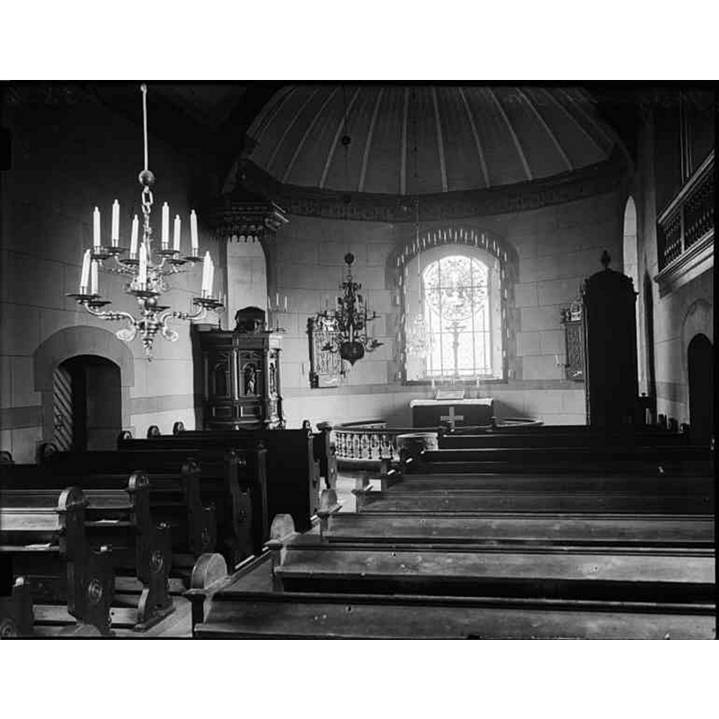 shown here before the 1939 renovation of the church, with the medieval font standing at the east end of the centre aisle