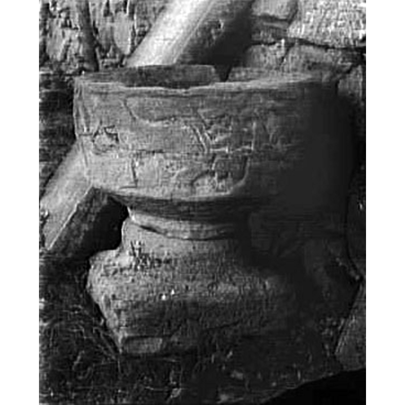 with damage showing; the 1894 photograph appears to have been taken outside the church