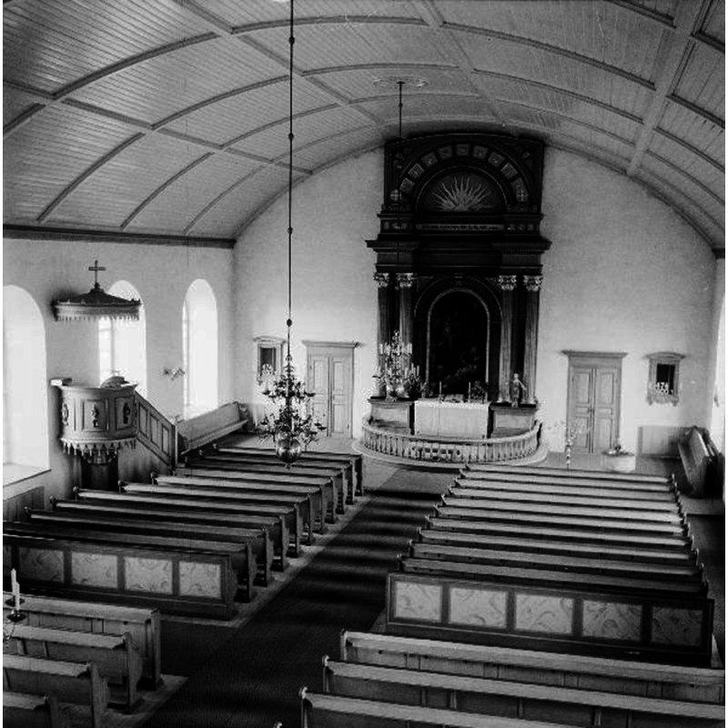 the top of the medieval font is visible at the far [east] end, right [south] side