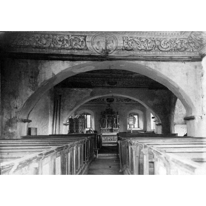 looking towards the altar; the top of the font cover is visible at the far end, on the left, near the pulpit
