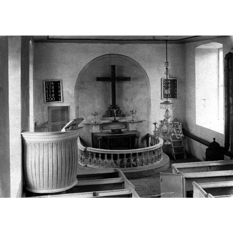 although not visible here, the medieval baptismal font was still used as the supporting base of the pulpit, left [north] side