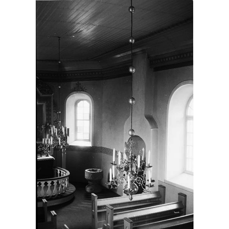 the medieval font seen here after the 1950 restoration of the church, at the east end, just right [south] of the communion railing -- Source caption: "Algutstorps kyrka [...] Interiör mot sydöst. Efter restaurering."