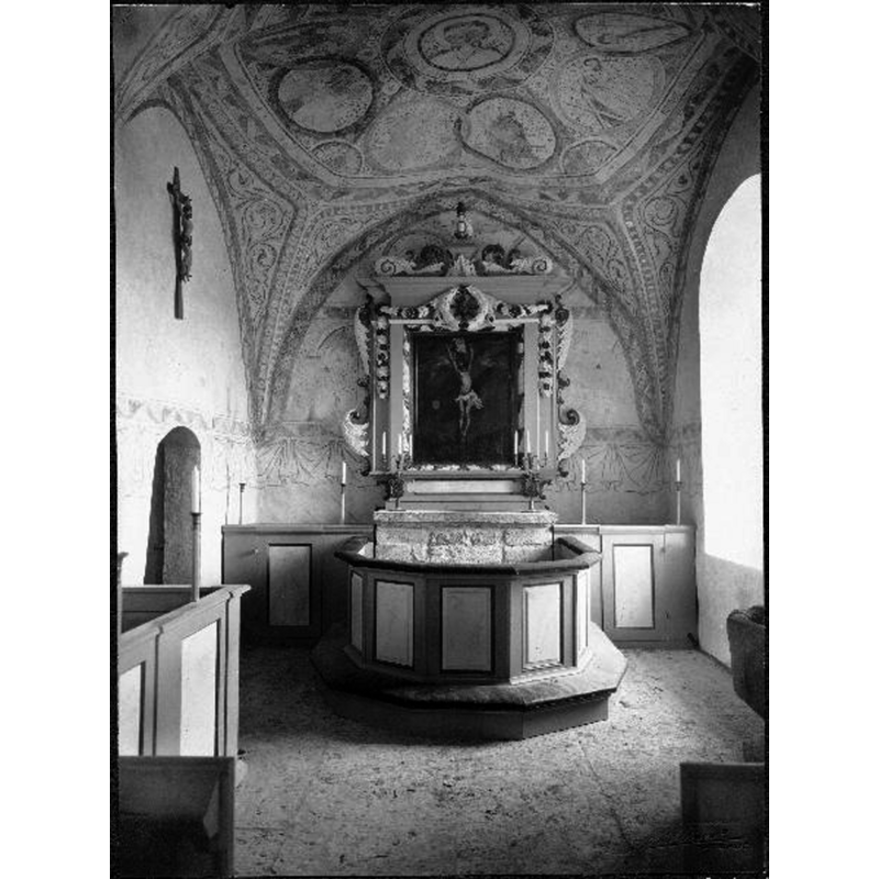 the medieval font is partially visible on the left [south] side