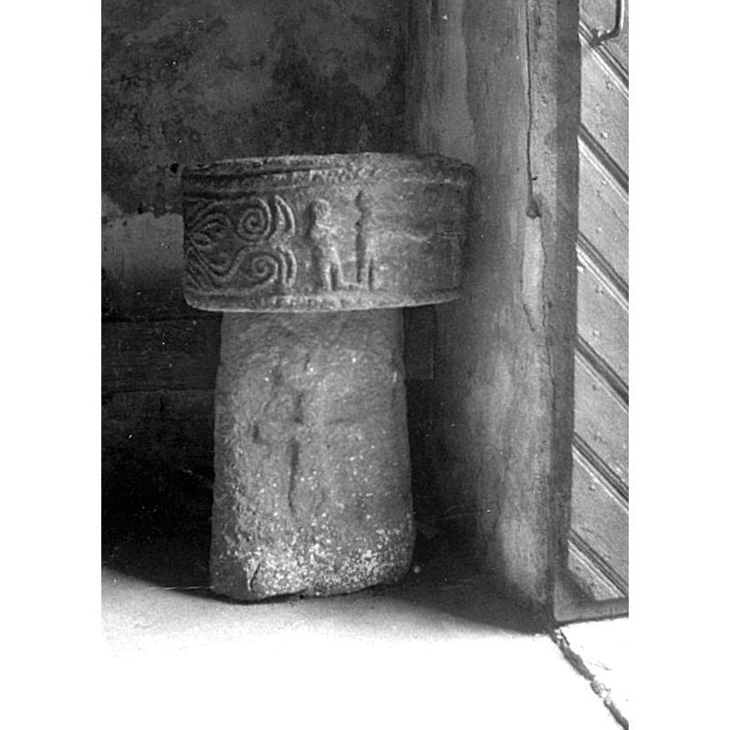 at the time, before 1954, the font is seen by the entranceway; it would be moved later to the east end of the nave