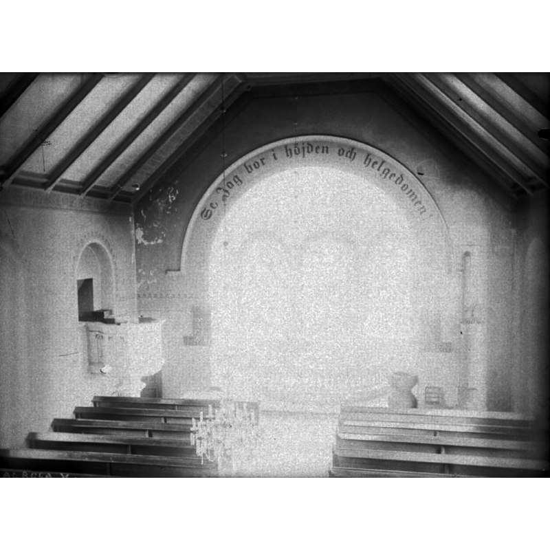 inside the new church, at the east end of the nave, south side