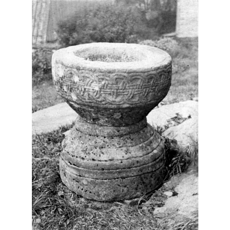 the font still outside the church
