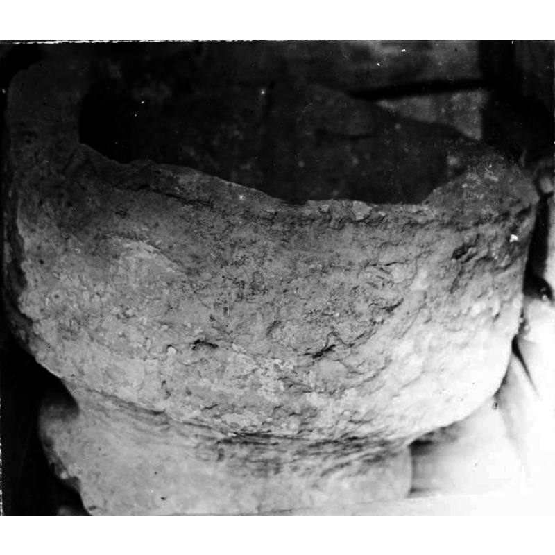the sorry state of the medieval font can be fully appreciated here; though undated the photograph must have been taken after 1891, when the basin sides still showed discernible detail, and 1935 when the font was restored