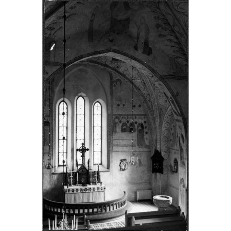 the font in the southeast corner of the chancel