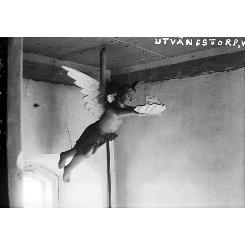Source caption: "Utvängstorps kyrka [...] Dopängel av trä."