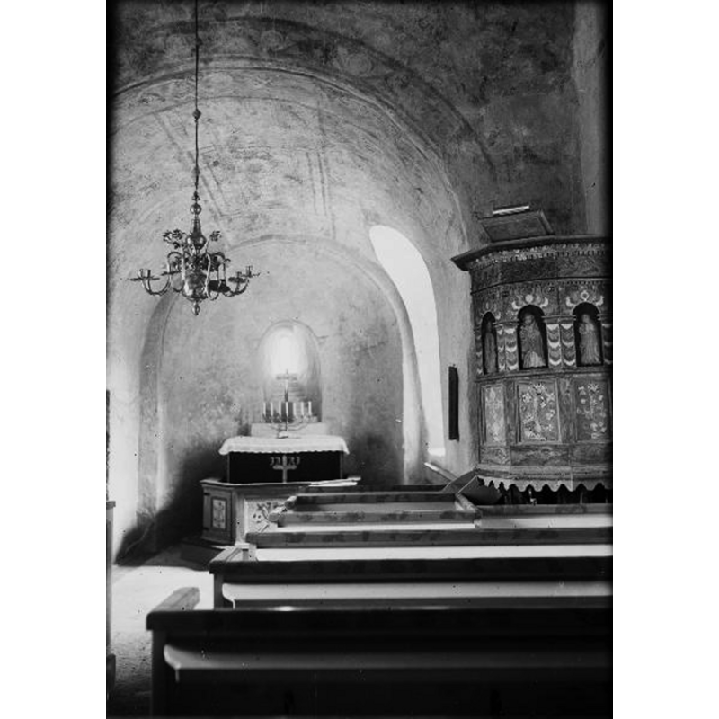 the interior of the old church photographed after the 1949 renovation; the old church had been abandoned in 1885 in favour of its replacement church, but was restored to regular use in the 1920s and renovated in 1949, when the medieval mural paintings were uncovered