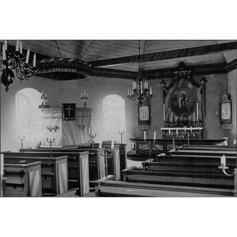 the top of the font is discernible at the far [east] end of the left [north] bank of pews -- that was the location of the font in 1936