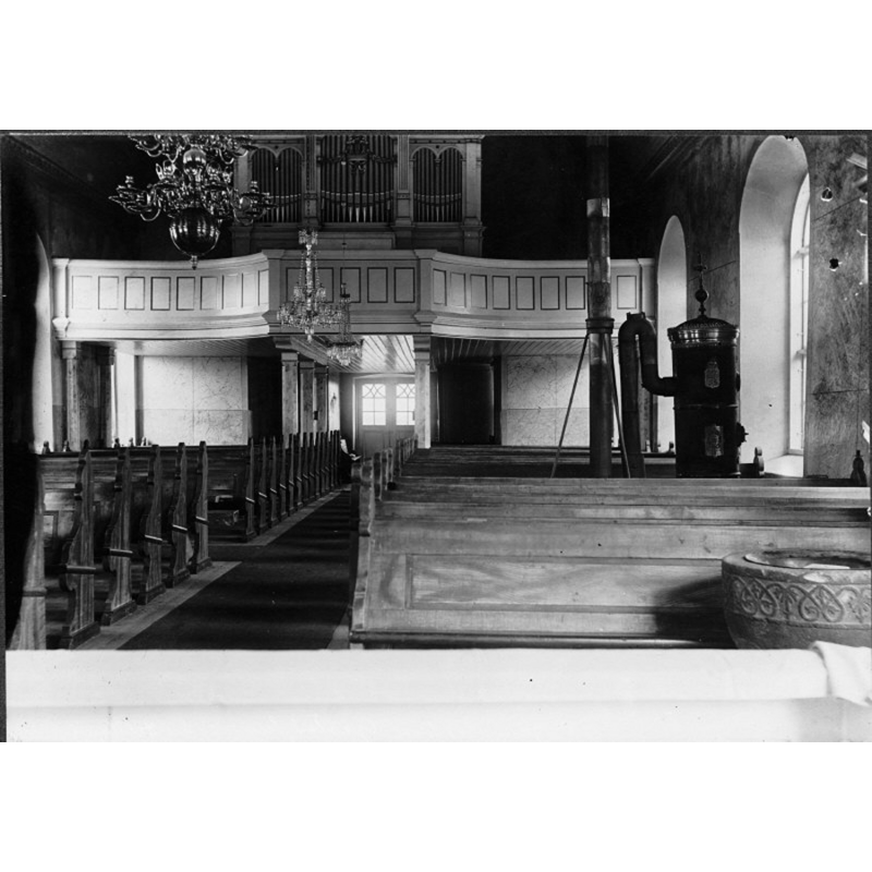 the old font is partially visible here in the bottom right corner of the image, i.e., the northeast corner of the nave