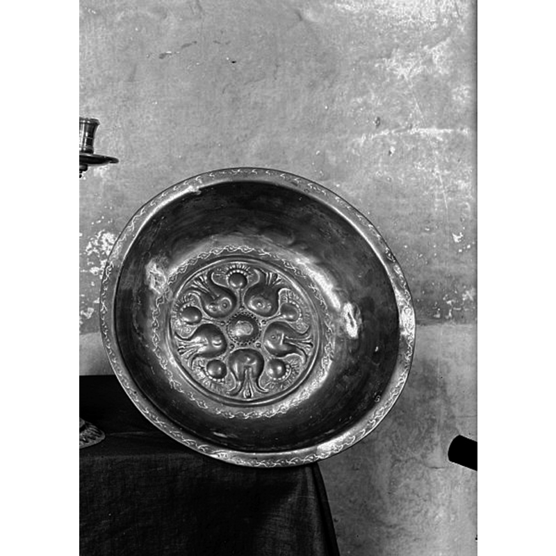 the metal baptismal dish used in conjunction with the present 1915 font