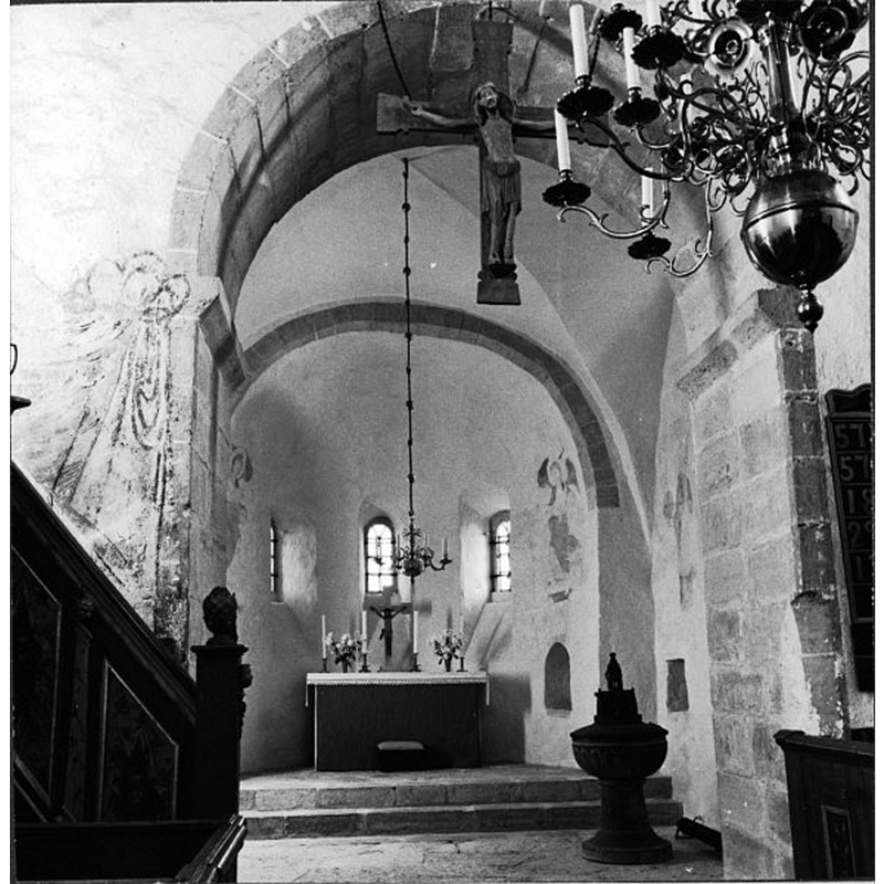 the location of the font is the same as 1891, 1922, etc., but the communion railing has been removed