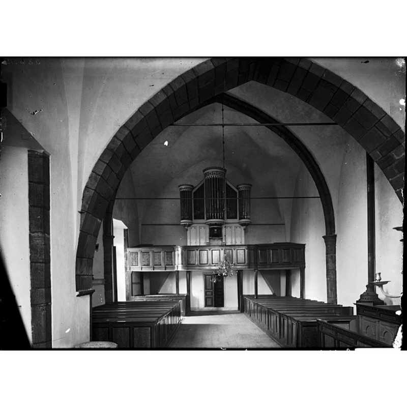 showing the top of the medieval font in the bottom left corner of the image