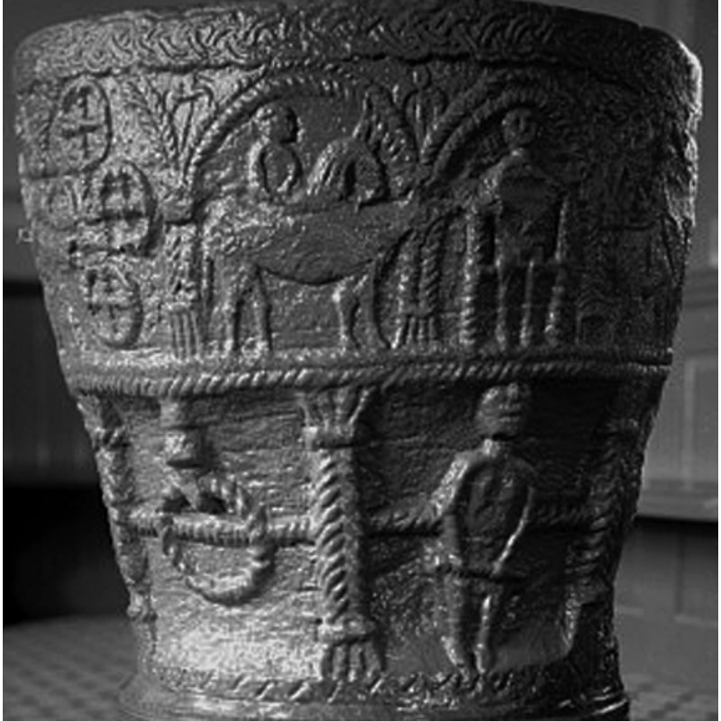 the ring appears to be hanging from the top of the frame and has a continuous rope right trough it -- one of two such; this one is followed on the right by a man standing and holding and object with both hands