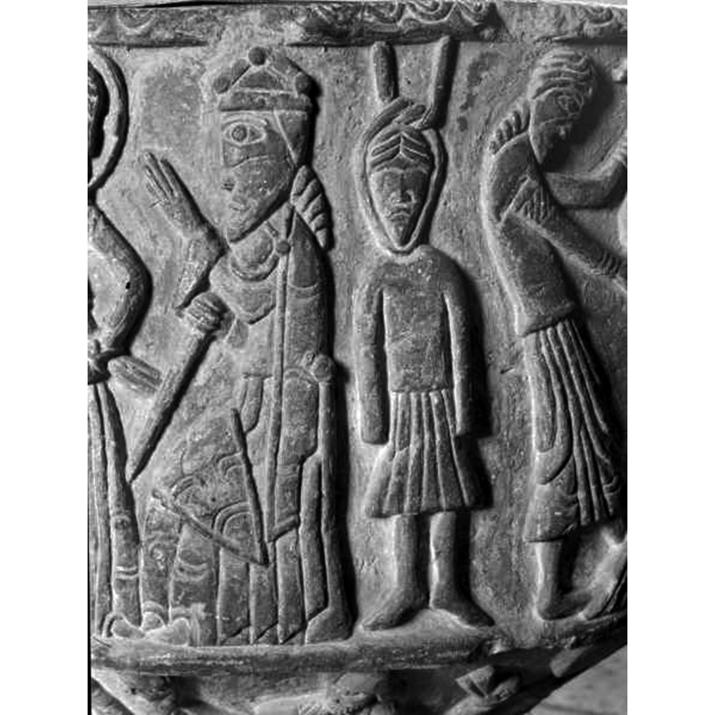 Source caption: "Löderups kyrka [...] Detalj av dopfunt av sandsten, avsmalnande uppåt, trattformig botten, utförd av Mäster Majestatis, slutet av 1100-talet."