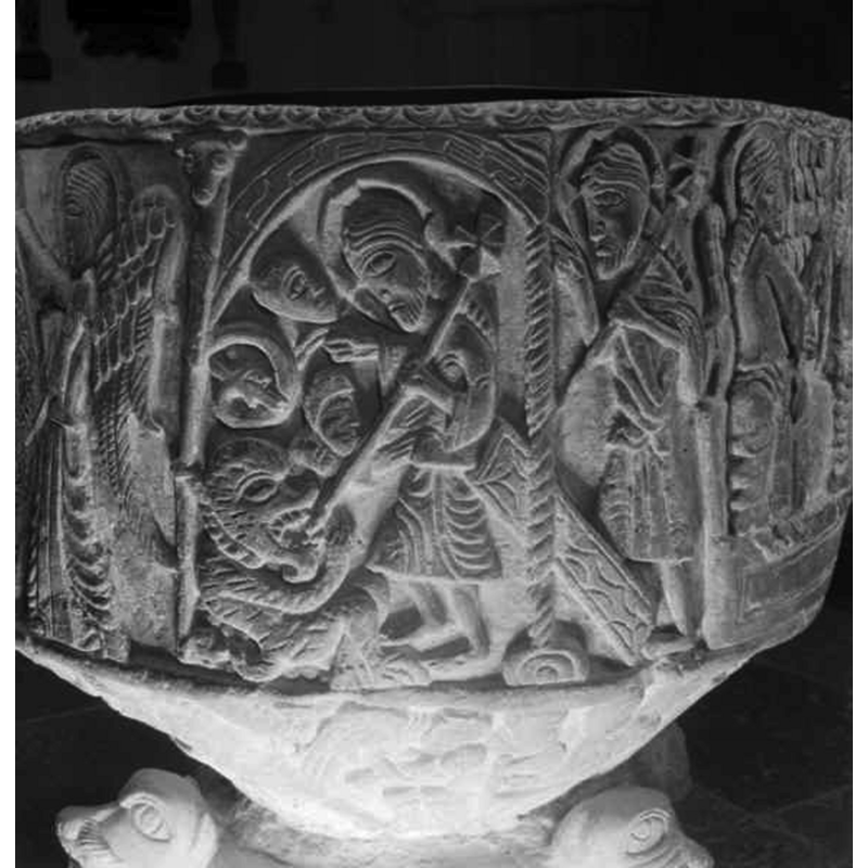 Source caption: "Löderups kyrka [...] Detalj av dopfunt av sandsten, avsmalnande uppåt, trattformig botten, utförd av Mäster Majestatis, slutet av 1100-talet."