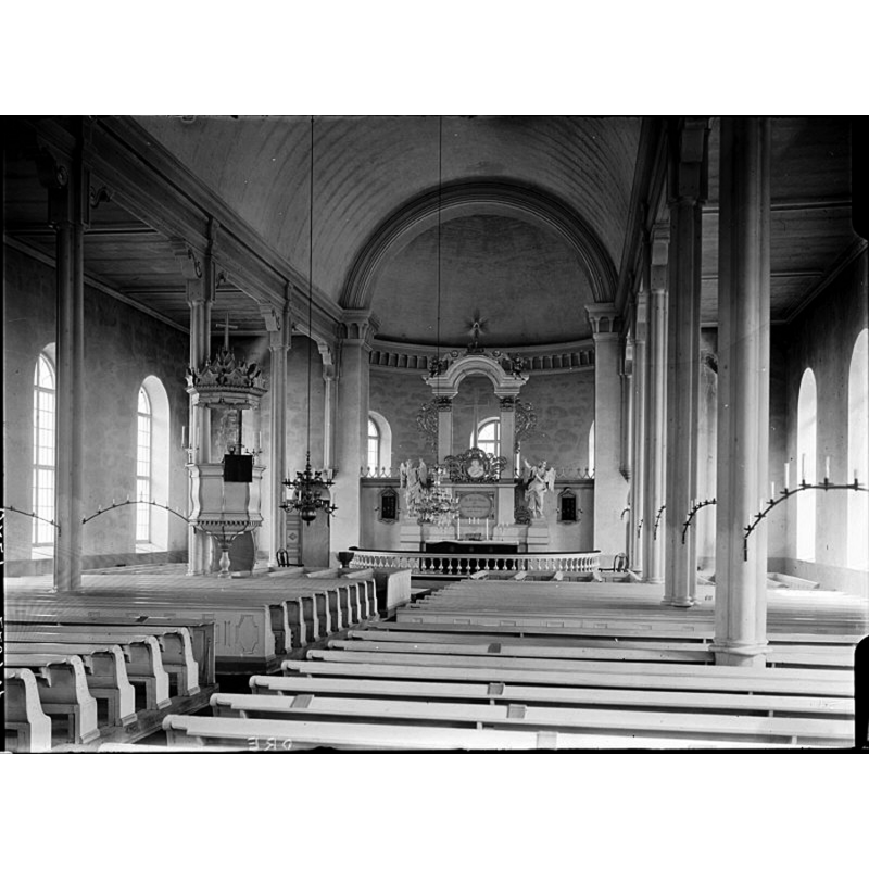 Source caption: "Ore kyrka [...] Interiör mot öster." -- the new church, consecrated 1874, replaced a medieval church here; the font is partially visible at the far [east] end, left [north] side