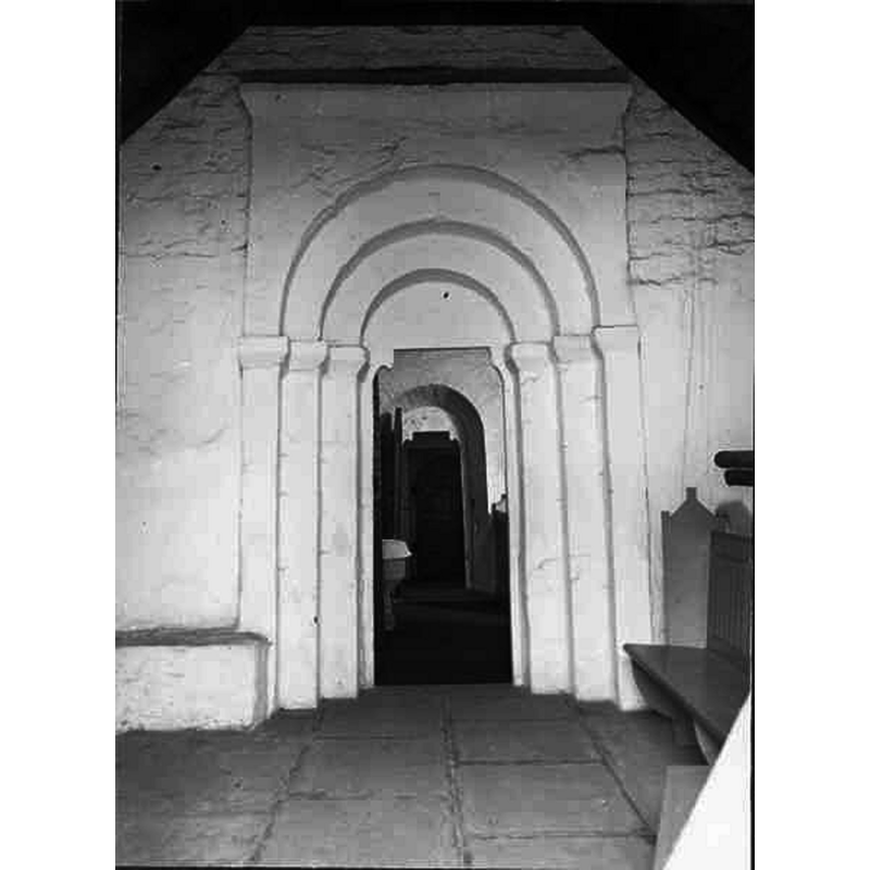 Source caption: "Östra Ingelstads kyrka [...] Portal." -- with a partial view of the baptismal font through the opening