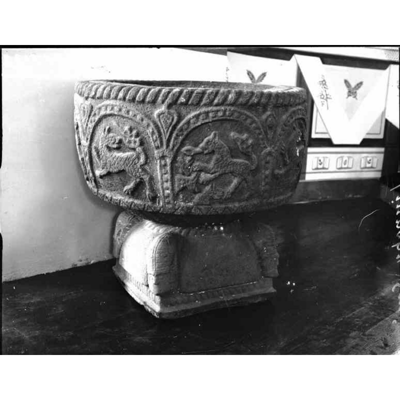 seen here in the left arch; the body covered in a pattern