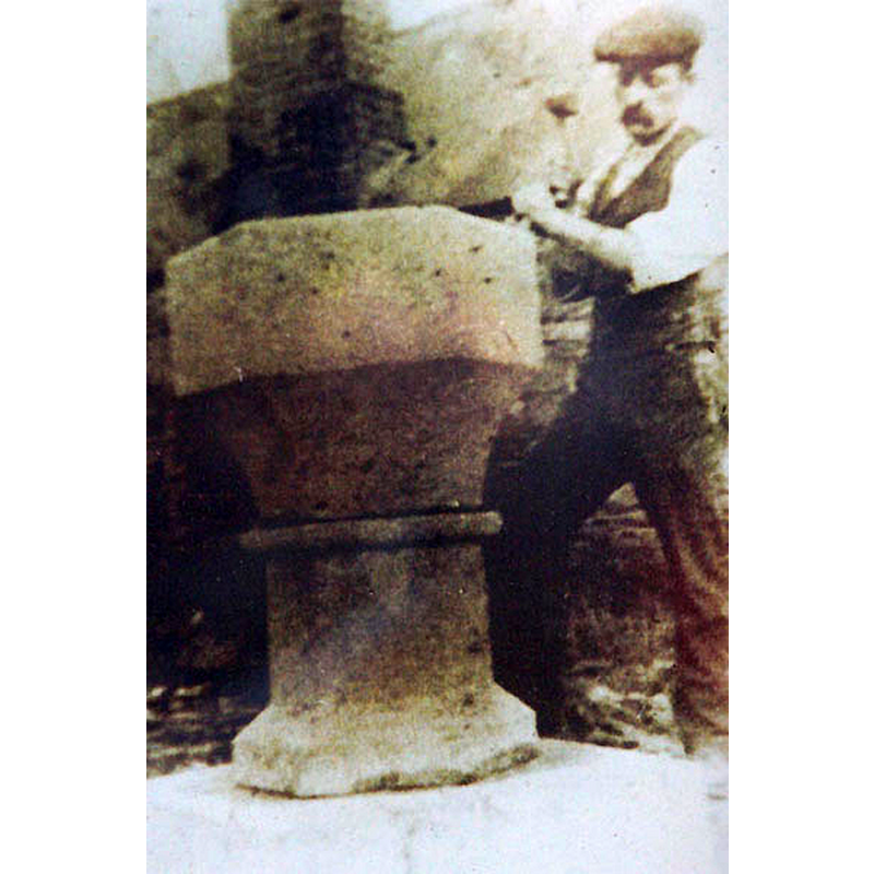 Source caption: "Mr Knight carving the font at Threlkeld Quarry, 1911."
