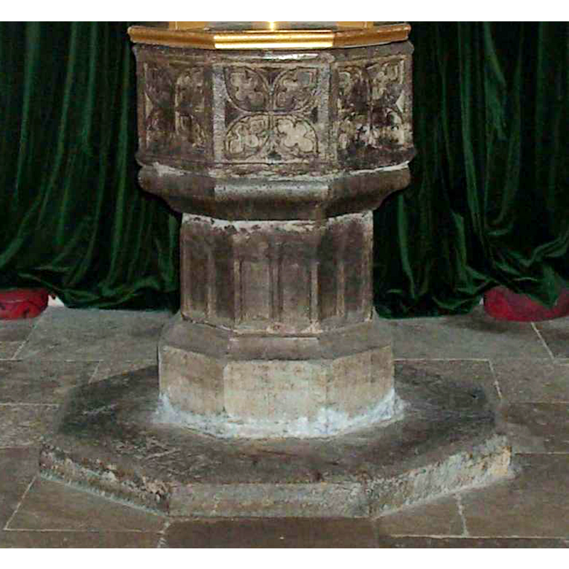 a pair in each panel of the octagonal stem of the base