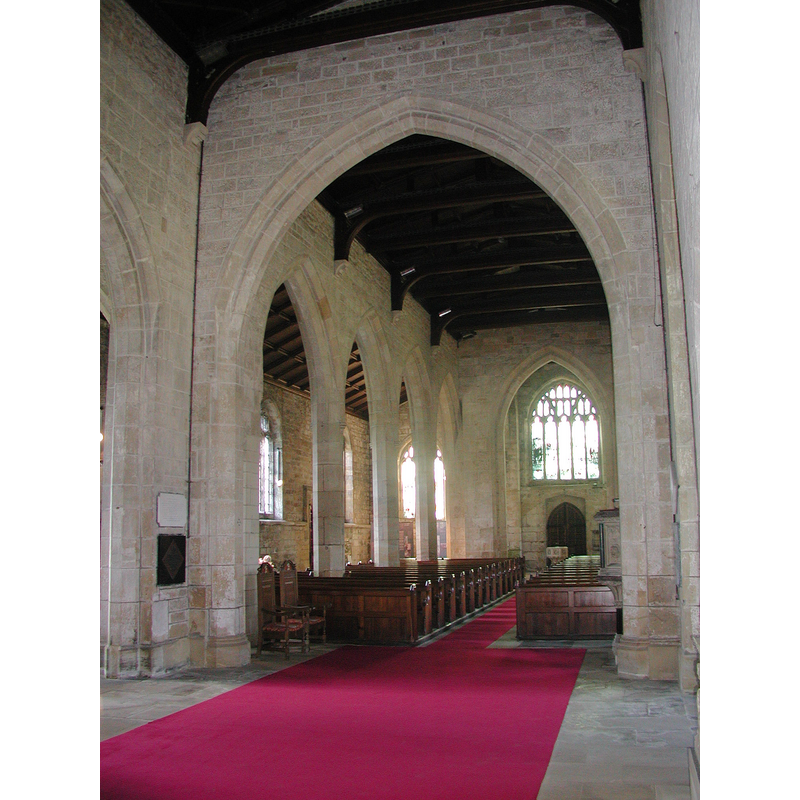 View from the transept: the font appears at the foot of the nave, before the W door