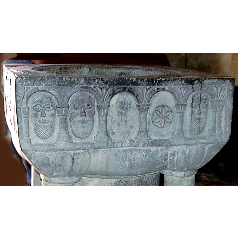 four of the arches contain other motifs; the central arch is now blank but may have contained a motif earlier