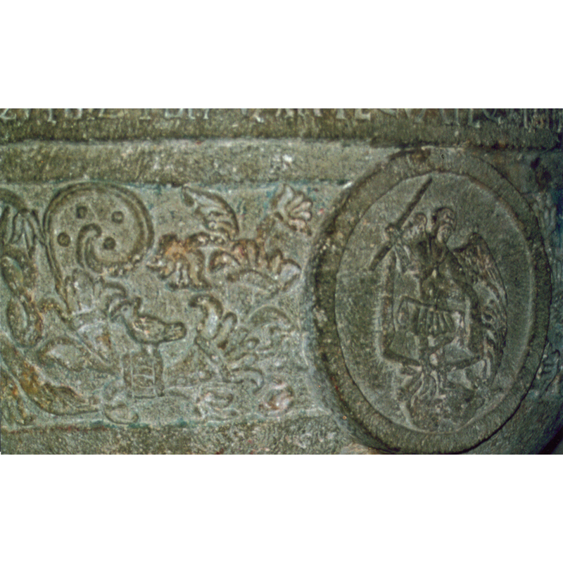 in one of the four medallions ornamenting the sides