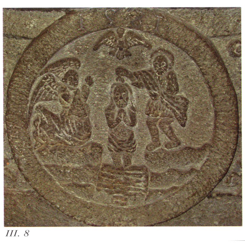 in one of the four medallions ornamenting the sides [Romero Quiroz [cf. Font notes] notes similarities in the representation of the river with the the monolith at Teotenango and the 'caja' at Monte Alban]