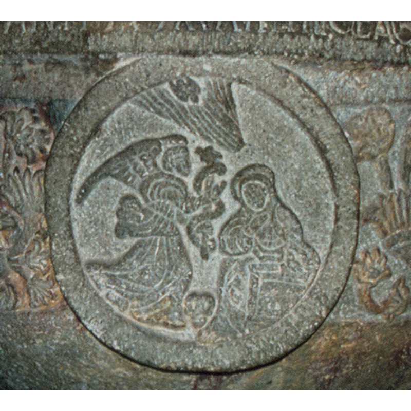in one of the four medallions ornamenting the sides