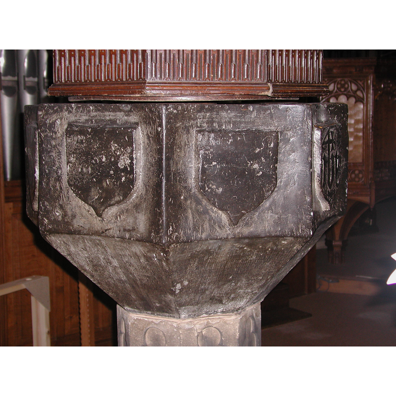 only two of the eight shields have an emblem; the other six are blank